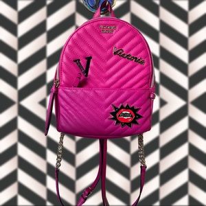 Hot pink faux leather mini backpack